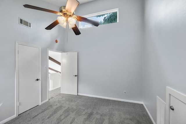 2919 Lake View Dr, Missouri City, TX 77459 - carpeted spare room featuring ceiling fan and baseboards