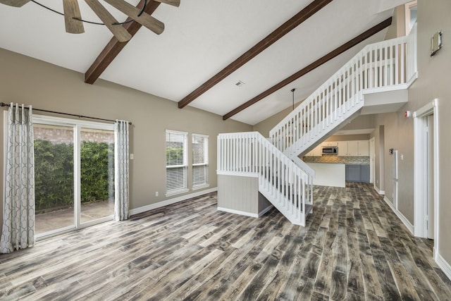 2919 Lake View Dr, Missouri City, TX 77459 - unfurnished living room with high vaulted ceiling, beamed ceiling, a ceiling fan, dark wood-style floors, and stairway