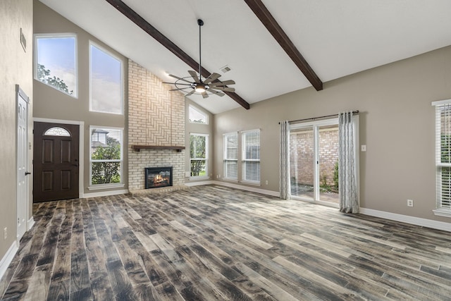 2919 Lake View Dr, Missouri City, TX 77459 - unfurnished living room featuring a ceiling fan, high vaulted ceiling, wood finished floors, a brick fireplace, and beam ceiling