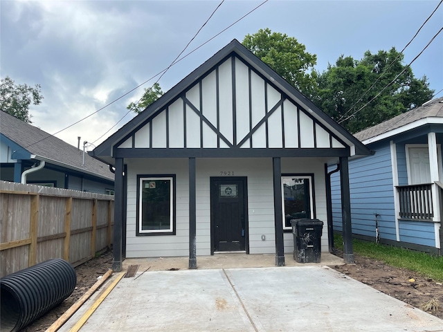 7921 Virgil St, Houston, TX 77088 - view of front facade featuring board and batten siding and a porch