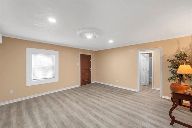 4505 Memorial Dr, Waco, TX 76711 - empty room with light wood-style floors, ornamental molding, and recessed lighting