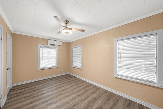 4505 Memorial Dr, Waco, TX 76711 - empty room with an AC wall unit, ornamental molding, wood finished floors, and ceiling fan
