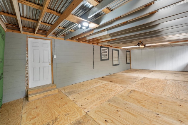 4505 Memorial Dr, Waco, TX 76711 - basement featuring wooden walls and ceiling fan