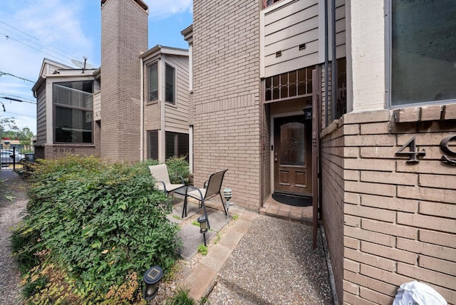 4904 Feagan St Unit 1, Houston, TX 77007 - entrance to property featuring brick siding and a chimney