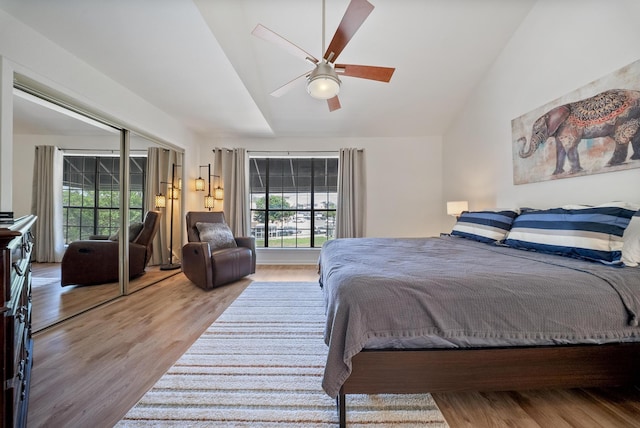 4904 Feagan St Unit 1, Houston, TX 77007 - bedroom with vaulted ceiling, multiple windows, wood finished floors, and ceiling fan