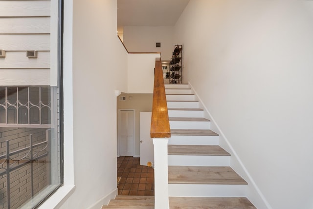 4904 Feagan St Unit 1, Houston, TX 77007 - stairway with baseboards and wood finished floors