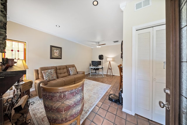 4904 Feagan St Unit 1, Houston, TX 77007 - tiled living area with ornamental molding, a ceiling fan, and an office area