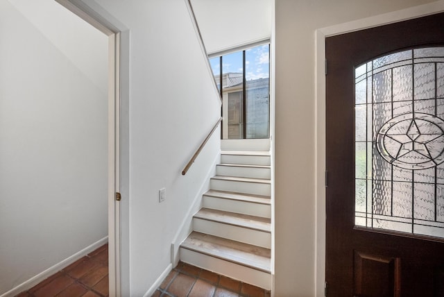 4904 Feagan St Unit 1, Houston, TX 77007 - foyer entrance with tile patterned floors and stairs