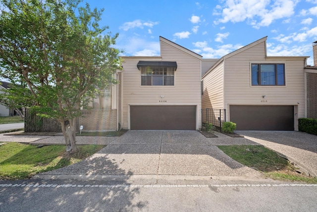 4904 Feagan St Unit 1, Houston, TX 77007 - view of front of house with a garage and concrete driveway