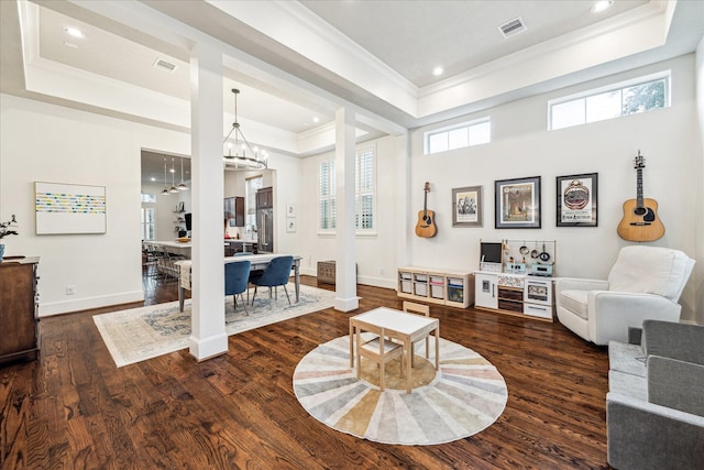 1035 Waverly St Unit B, Houston, TX 77008 - living room featuring a raised ceiling, crown molding, dark wood-type flooring, and recessed lighting