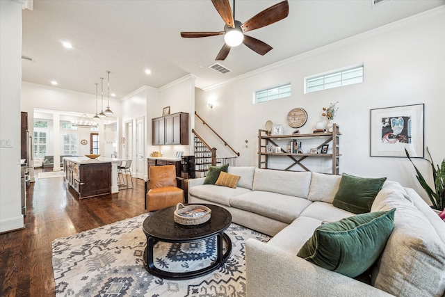 1035 Waverly St Unit B, Houston, TX 77008 - living area with crown molding, dark wood finished floors, ceiling fan, stairs, and recessed lighting