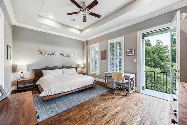 1035 Waverly St Unit B, Houston, TX 77008 - bedroom with access to outside, wood finished floors, a tray ceiling, recessed lighting, and ornamental molding
