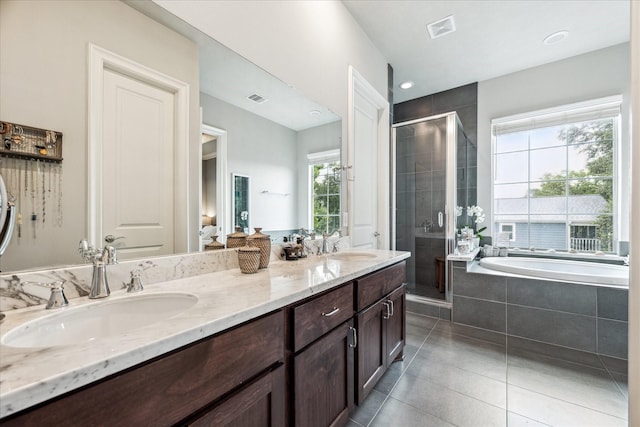 1035 Waverly St Unit B, Houston, TX 77008 - bathroom featuring tile patterned flooring, double vanity, a bath, and a shower stall