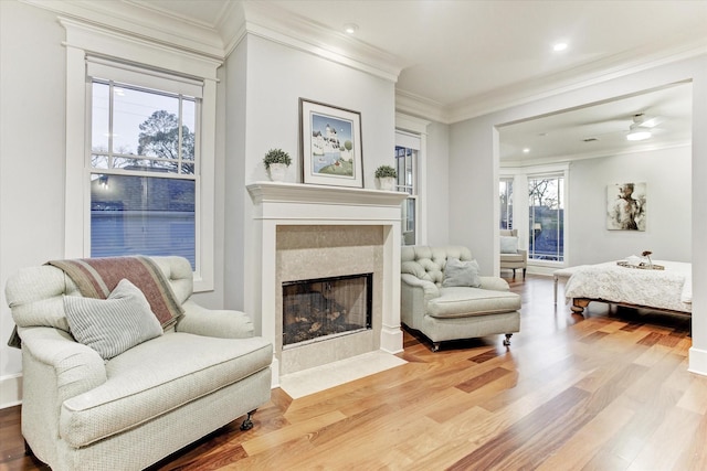 2317 Ashland St, Houston, TX 77008 - bedroom featuring ornamental molding, wood finished floors, a premium fireplace, and recessed lighting