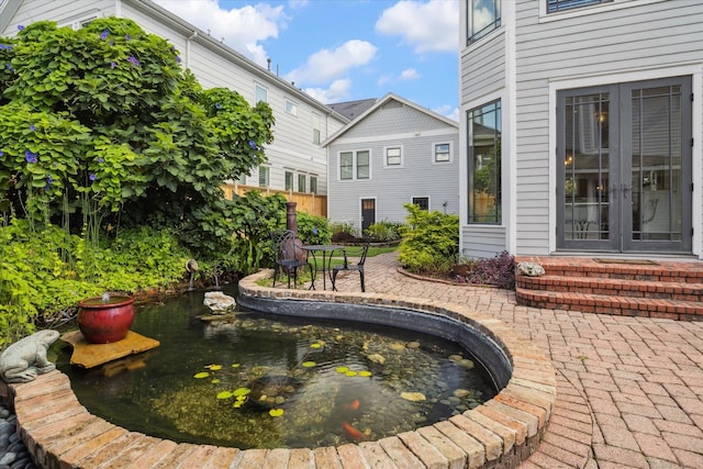2317 Ashland St, Houston, TX 77008 - view of home's community with a garden pond