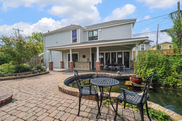 2317 Ashland St, Houston, TX 77008 - back of house featuring a patio