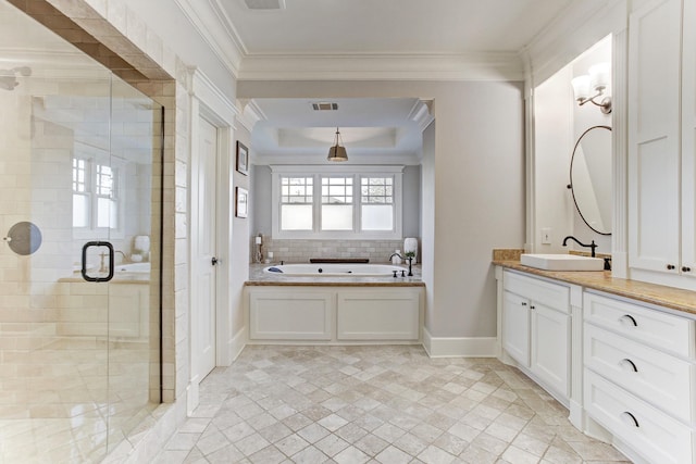 2317 Ashland St, Houston, TX 77008 - full bath with a garden tub, a stall shower, vanity, crown molding, and backsplash