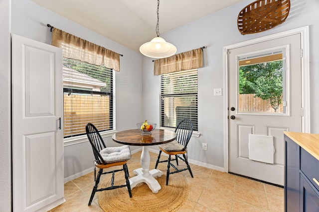 2715 Lexington Park Dr, Spring, TX 77373 - dining room with light tile patterned flooring and plenty of natural light