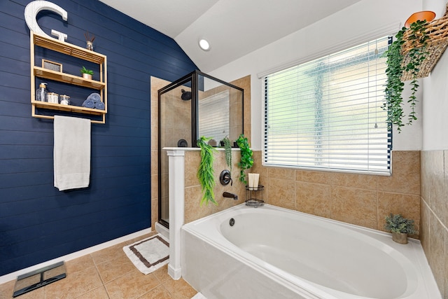 2715 Lexington Park Dr, Spring, TX 77373 - bathroom with a garden tub, a stall shower, lofted ceiling, and tile patterned floors