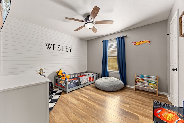 2715 Lexington Park Dr, Spring, TX 77373 - bedroom with light wood-style flooring and ceiling fan