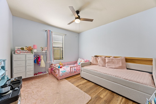 2715 Lexington Park Dr, Spring, TX 77373 - bedroom featuring wood finished floors and ceiling fan