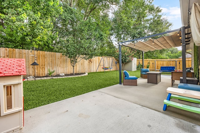 2715 Lexington Park Dr, Spring, TX 77373 - fenced backyard featuring an outdoor hangout area, a patio area, a storage unit, and a pergola