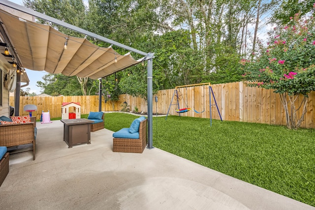 2715 Lexington Park Dr, Spring, TX 77373 - fenced backyard with a patio area and an outdoor hangout area