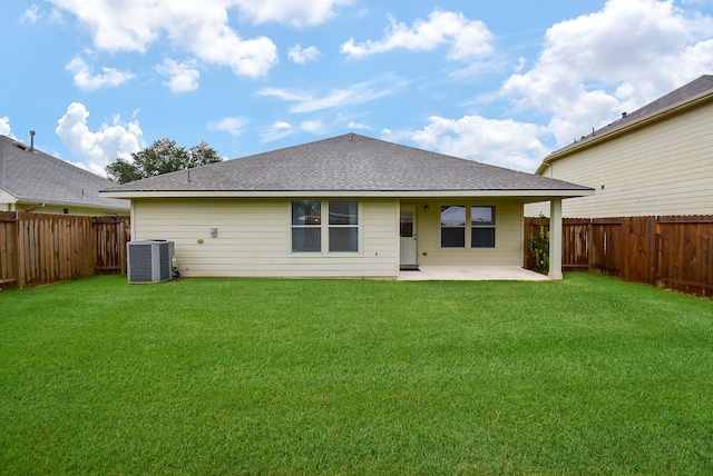 2715 Trinity Glen Ln, Houston, TX 77047 - back of property featuring a patio, a fenced backyard, and roof with shingles