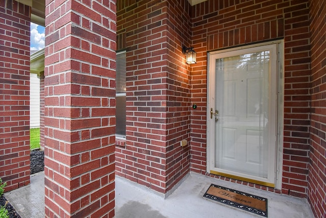 2715 Trinity Glen Ln, Houston, TX 77047 - doorway to property featuring brick siding