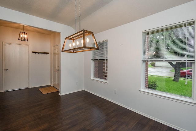 2715 Trinity Glen Ln, Houston, TX 77047 - unfurnished dining area featuring a chandelier and dark wood-type flooring