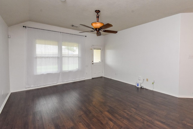 2715 Trinity Glen Ln, Houston, TX 77047 - unfurnished room with dark wood-style floors, ceiling fan, and lofted ceiling