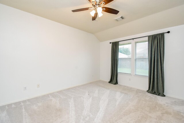 2715 Trinity Glen Ln, Houston, TX 77047 - unfurnished room featuring lofted ceiling, light carpet, and a ceiling fan