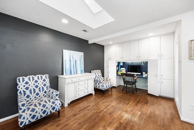 12215 Cobblestone Dr, Houston, TX 77024 - home office featuring dark wood finished floors, a skylight, and recessed lighting