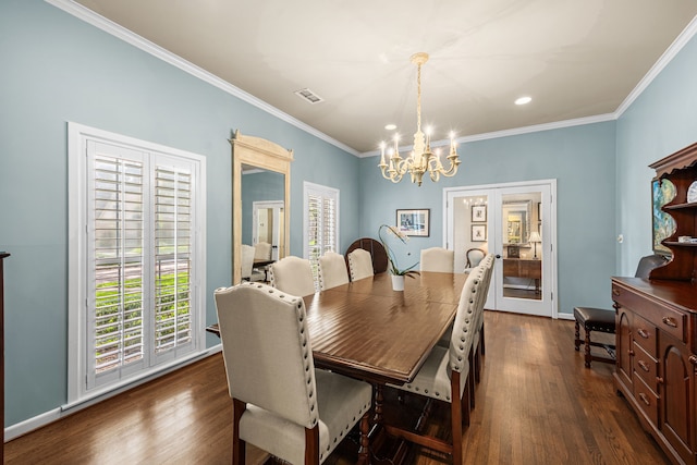12215 Cobblestone Dr, Houston, TX 77024 - dining room featuring a chandelier, dark wood-type flooring, crown molding, and recessed lighting