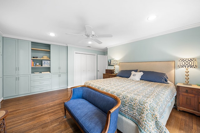 12215 Cobblestone Dr, Houston, TX 77024 - bedroom featuring crown molding, dark wood finished floors, recessed lighting, a ceiling fan, and multiple closets