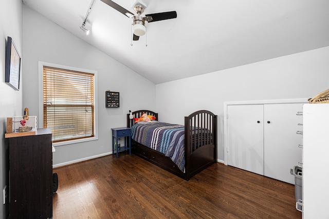 12215 Cobblestone Dr, Houston, TX 77024 - bedroom with lofted ceiling, wood finished floors, and ceiling fan