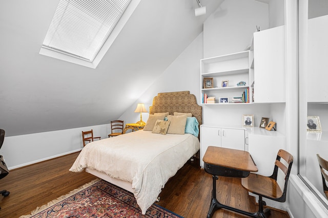 12215 Cobblestone Dr, Houston, TX 77024 - bedroom with dark wood-style flooring and vaulted ceiling