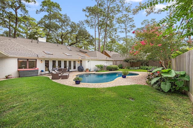 12215 Cobblestone Dr, Houston, TX 77024 - view of swimming pool with a hot tub, a fenced backyard, a patio, and an outdoor hangout area