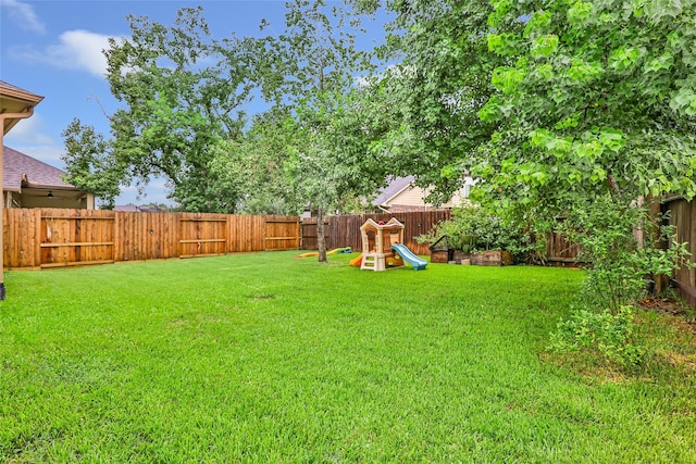 13015 Barkley Bend Ln, Houston, TX 77044 - fenced backyard with a playground