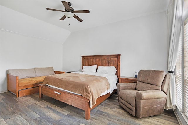 13015 Barkley Bend Ln, Houston, TX 77044 - bedroom with wood finished floors, a ceiling fan, and vaulted ceiling
