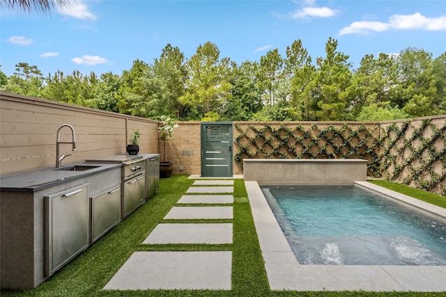 6508 Haskell St, Houston, TX 77007 - outdoor pool with an outdoor kitchen and a fenced backyard