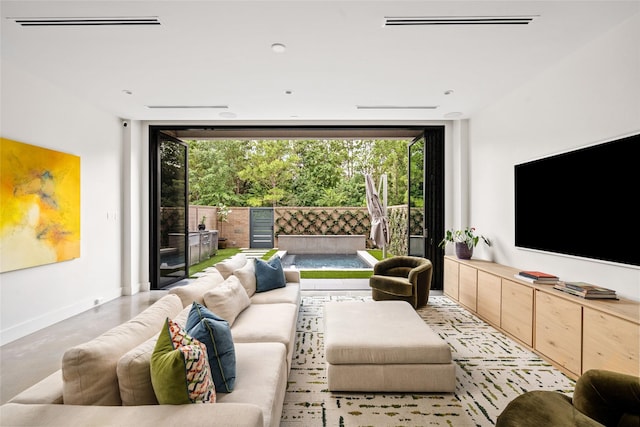 6508 Haskell St, Houston, TX 77007 - living room with expansive windows and healthy amount of natural light