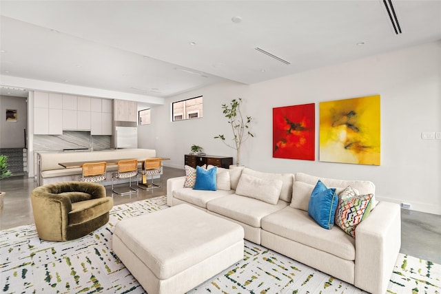 6508 Haskell St, Houston, TX 77007 - living room featuring concrete floors