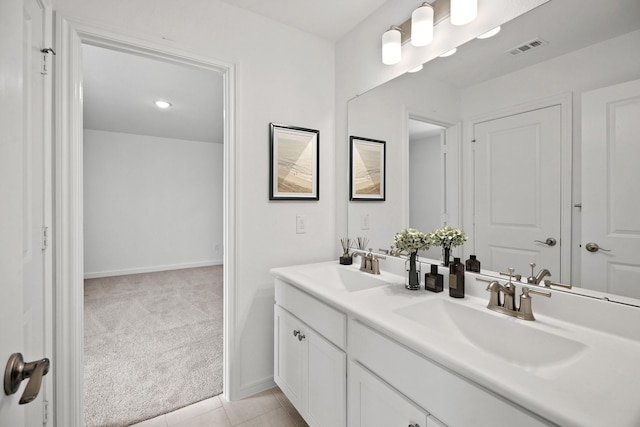 21218 Blue Bluff Dr, Cypress, TX 77433 - bathroom featuring double vanity and tile patterned flooring