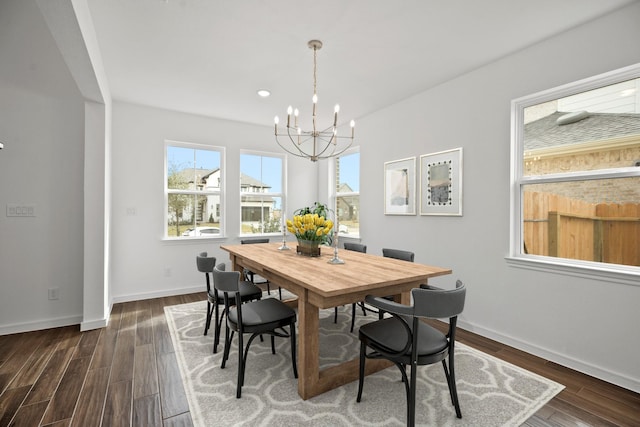 21218 Blue Bluff Dr, Cypress, TX 77433 - dining room featuring a chandelier and dark wood-style flooring