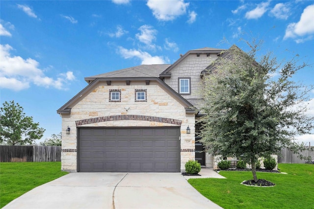 3218 Camelia Chase Ct, Spring, TX 77373 - french country home with stone siding, concrete driveway, and an attached garage