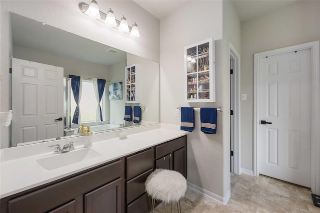 3218 Camelia Chase Ct, Spring, TX 77373 - bathroom featuring vanity and baseboards