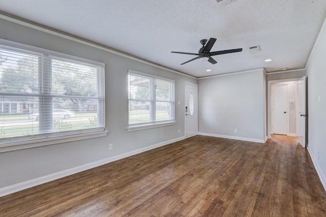 2007 Wakefield Dr, Houston, TX 77018 - unfurnished room featuring plenty of natural light, ornamental molding, wood finished floors, a ceiling fan, and recessed lighting