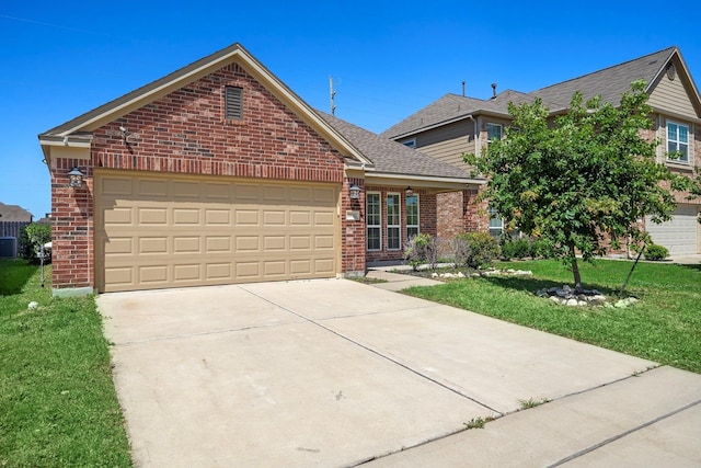 19842 Haven Cliff Ln, Cypress, TX 77433 - view of front of house with brick siding, a front yard, driveway, a garage, and roof with shingles