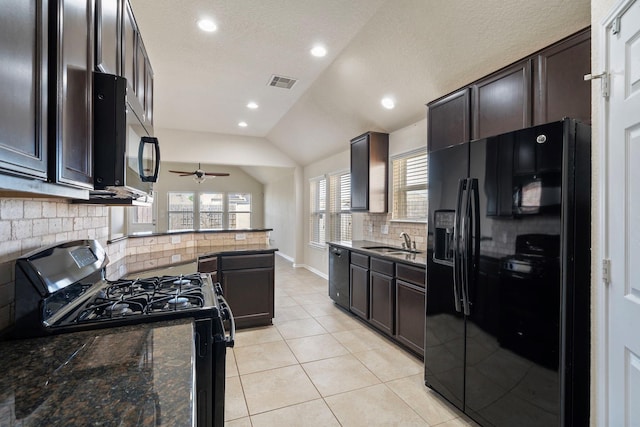 19842 Haven Cliff Ln, Cypress, TX 77433 - kitchen featuring black appliances, tasteful backsplash, a ceiling fan, vaulted ceiling, and dark brown cabinets